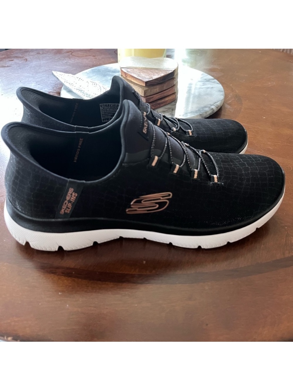 Skechers ladies  Black Knit Slip-On Sneakers with White Sole